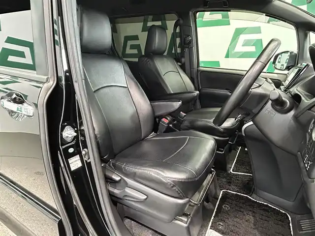 トヨタ ヴォクシー ZS 煌 鹿児島県 2018(平30)年 7.5万km ブラック ワンオーナー/社外ナビ（NX617）/バックカメラ/両側パワースライドドア/前後ドライブレコーダー/ETC/フルセグTV/アダプティブクルーズコントロール/レーンキープアシスト/社外マフラー/純正フロアマット/革調シートカバー/アイドリングストップ/ドアバイザー/社外19インチアルミホイール（RAY’ｓ）/LEDヘッドライト