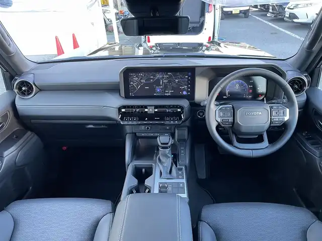 トヨタ ランドクルーザー ２５０ VX 東京都 2025(令7)年 0.2万km ブラック プリクラッシュセーフティ/レーントレーシングアシスト/レーンディパーチャーアラート/12.3インチ純正メーカーナビ/フルセグテレビ/Bluetooth/USB HDMI接続/サンルーフ/レザーシート/シートーヒーター/シートベンチレーション/デジタルインナーミラー/パノラマモニター/3眼LEDヘッドライト/パワーバックドア/ルーフレール/スマートキー/ステアリングヒーター/クルーズコントロール