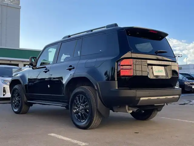 トヨタ ランドクルーザー ２５０ VX 東京都 2025(令7)年 0.2万km ブラック プリクラッシュセーフティ/レーントレーシングアシスト/レーンディパーチャーアラート/12.3インチ純正メーカーナビ/フルセグテレビ/Bluetooth/USB HDMI接続/サンルーフ/レザーシート/シートーヒーター/シートベンチレーション/デジタルインナーミラー/パノラマモニター/3眼LEDヘッドライト/パワーバックドア/ルーフレール/スマートキー/ステアリングヒーター/クルーズコントロール