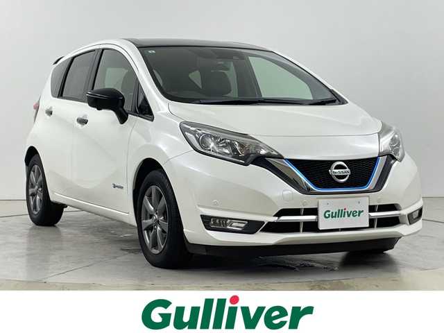 日産 ノート e－パワー メダリスト Bアロー 道央・札幌 2017(平29)年 12万km ブリリアントホワイトパール/スーパーブラック 2トーン ・純正ナビ（MM517D-W）/（BT/CD/DVD/SD/AUX/フルセグTV）/・ハーフレザーシート/・LEDヘッドライト/・アラウンドビューモニター/・ステアリングスイッチ/・オートライト/・横滑り防止装置/・社外ドライブレコーダー（前方）/・レーダークルーズコントロール/・エマージェンシーブレーキ/・ETC/・レーンキープアシスト/・デジタルインナーミラー/・電動格納ミラー