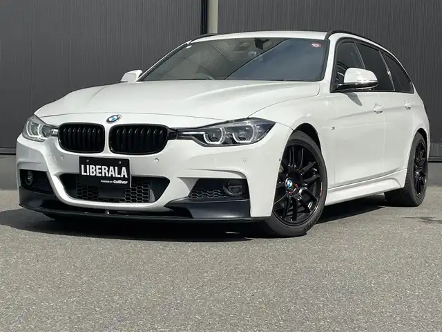 ＢＭＷ ３２０ｄ ツーリング Mスポーツ 香川県 2015(平27)年 4.8万km アルピンホワイトⅢ 純正ナビ/バックカメラ/ACC/ヘッドアップディスプレイ/前後センサー/パワーシート/ブラインドスポットモニター/パワーバックドア/社外（ENKEI）18インチAW