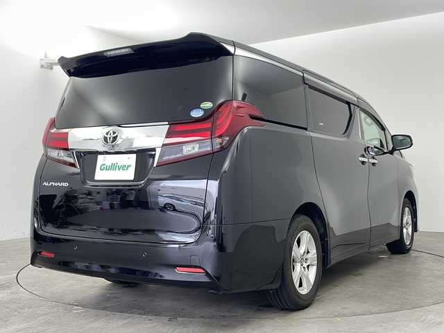 トヨタ アルファード X 兵庫県 2016(平28)年 6.9万km ブラック ・純正9インチナビ/CD/DVD/TV/Bluetooth/SD/・純正リアフリップダウンモニター/・バックカメラ/・両側パワースライドドア/・前後コーナーセンサー/・オートライト/・LEDヘッドライト/・オートブレーキホールド/・AC100V電源/・MTモード付AT/・WACエアコン/・純正アルミホイール/・純正フロアマット/・横滑り防止機能/・盗難防止装置/・三列シート/・チップアップシート/・W＋サイドエアバック/・カーテンエアバック/・ビルドインETC/・スマートキー/・スペアキー/・プッシュスタート