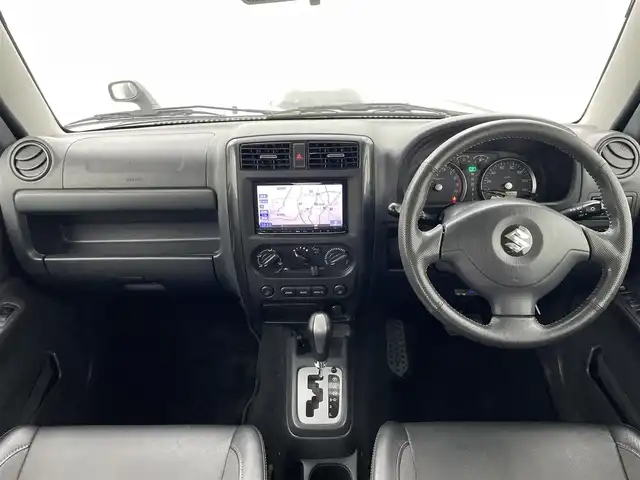 スズキ ジムニー クロスアドベンチャー XC 熊本県 2011(平23)年 10.7万km クエーサーグレーメタリック 禁煙車　/社外ナビ　/ＥＴＣ　/運転席シートヒーター　/電動格納ミラー　/純正フロアマット　/純正１６インチＡＷ　/ＬＥＤヘッドライト