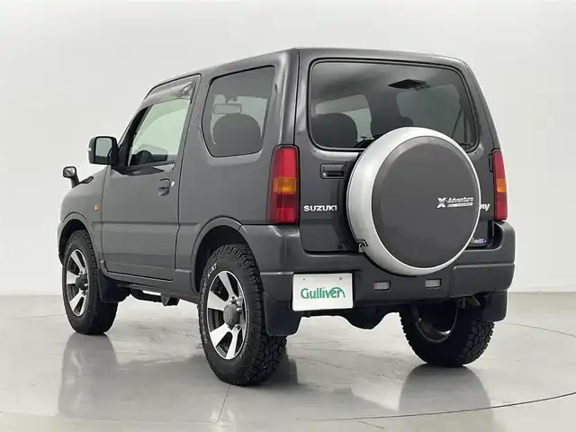 スズキ ジムニー クロスアドベンチャー XC 熊本県 2011(平23)年 10.7万km クエーサーグレーメタリック 禁煙車　/社外ナビ　/ＥＴＣ　/運転席シートヒーター　/電動格納ミラー　/純正フロアマット　/純正１６インチＡＷ　/ＬＥＤヘッドライト