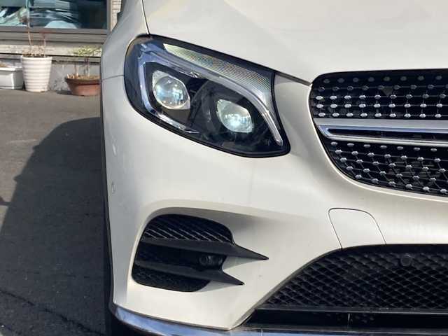 メルセデス・ベンツ ＧＬＣ２００ クーペスポーツ 大分県 2018(平30)年 5.9万km 白 ハーフレザーシート/全方位カメラ/純正19インチアルミホイール/純正ナビ/フルセグTV/Bluetooth/DVD/純正フロアマット/純正LEDヘッドライト/オートライト/ETC/レーンキープアシスト/横滑り防止装置/電動リアゲート