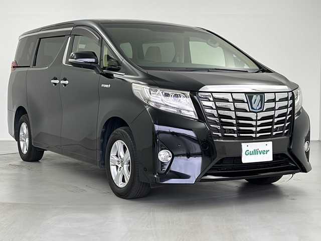 トヨタ アルファードハイブリット X 岐阜県 2016(平28)年 6.8万km ブラック 純正ナビ/　(AM/FM/CD/DVD/Bluetooth/フルセグTV)/純正フリップダウンモニター/マルチビューモニター/JBLプレミアムサウンド/レーダークルーズコントロール/コーナーセンサー/両側パワースライドドア/LEDヘッドライト/電動パーキングブレーキ/スペアキー/純正アルミホイール/純正フロアマット/純正ドアバイザー