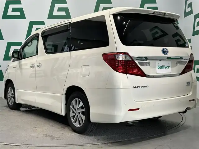 トヨタ アルファードハイブリット SR Cパッケージ 鹿児島県 2014(平26)年 6.8万km ゴールドパールクリスタルシャイン 純正ナビ/バックカメラ/ツインサンルーフ/フリップダウンモニター/両側パワースライドドア/ビルトインETC/フルセグTV（TVキャンセラー付き）/AC100V/オットマン/パワーバックドア/レザーシート/前席パワーシート/前席シートヒーター/シートメモリ/クルーズコントロール/レーンキープアシスト/コンビハンドル/オートライト/AFS/純正フロアマット/純正16インチアルミホイール