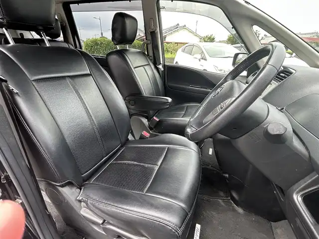 日産 セレナ ライダー Bライン Sハイブリッド 宮崎県 2013(平25)年 11.9万km スーパーブラック /ナビ(MC312D-W)//TV/CD/DVD/Bluetooth//両側パワースライドドア//フリップダウンモニター//バックカメラ//ETC//純正フロアマット//社外アルミホイール//ドアバイザー//オートライト//ステアリングスイッチ//電格ウィンカーミラー//取扱説明書//保証書//スペアキー×１