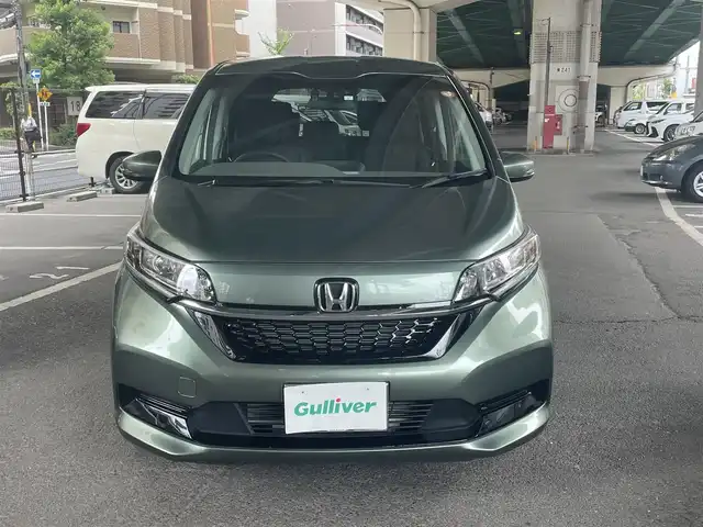 ホンダ フリード G 鹿児島県 2023(令5)年 0.2万km シルバーミストグリーンM ホンダセンシング/・衝突軽減ブレーキ/・歩行者事故低減ステアリング/・アダプティブクルーズコントロール/・車線維持支援システム/・誤発進抑制機能/・先行車発進お知らせ機能/・マルチインフォメーションディスプレイ/純正ナビ/・Bluetooth/・フルセグTV/・バックカメラ/純正15インチアルミホイール/両側パワースライドドア/インパネセンターテーブル/LEDヘッドライト/・オートライト/シートヒーター/ワンオーナー/新車保証書/取扱説明書