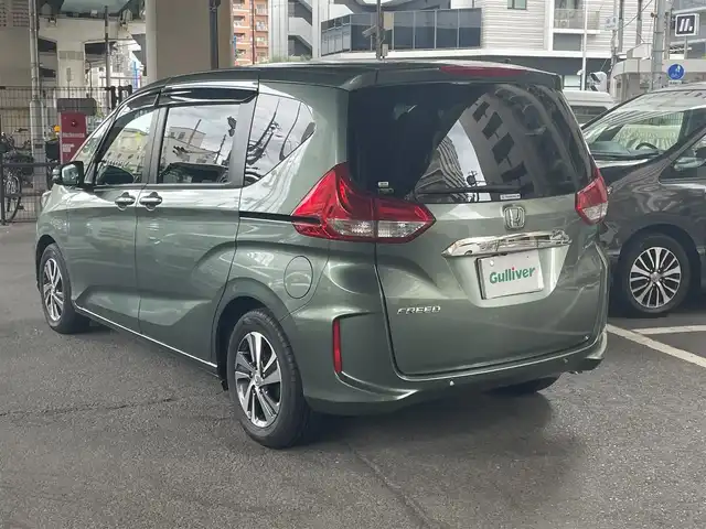 ホンダ フリード G 鹿児島県 2023(令5)年 0.2万km シルバーミストグリーンM ホンダセンシング/・衝突軽減ブレーキ/・歩行者事故低減ステアリング/・アダプティブクルーズコントロール/・車線維持支援システム/・誤発進抑制機能/・先行車発進お知らせ機能/・マルチインフォメーションディスプレイ/純正ナビ/・Bluetooth/・フルセグTV/・バックカメラ/純正15インチアルミホイール/両側パワースライドドア/インパネセンターテーブル/LEDヘッドライト/・オートライト/シートヒーター/ワンオーナー/新車保証書/取扱説明書