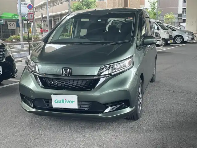 ホンダ フリード G 鹿児島県 2023(令5)年 0.2万km シルバーミストグリーンM ホンダセンシング/・衝突軽減ブレーキ/・歩行者事故低減ステアリング/・アダプティブクルーズコントロール/・車線維持支援システム/・誤発進抑制機能/・先行車発進お知らせ機能/・マルチインフォメーションディスプレイ/純正ナビ/・Bluetooth/・フルセグTV/・バックカメラ/純正15インチアルミホイール/両側パワースライドドア/インパネセンターテーブル/LEDヘッドライト/・オートライト/シートヒーター/ワンオーナー/新車保証書/取扱説明書