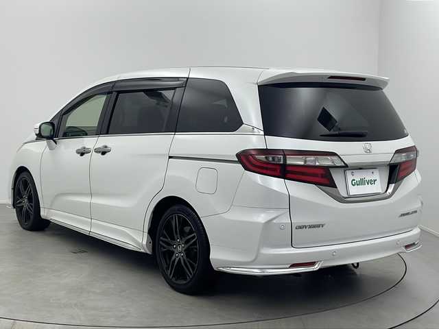ホンダ オデッセイ アブソルート・EXホンダセンジング 大阪府 2018(平30)年 5.9万km プラチナホワイトパール 純正9インチナビ/(フルセグTV/Bluetooth/CD/DVD/HDMI)/純正11.6インチフリップダウンモニター/全方位カメラ/ブラインドスポットモニター/ホンダセンシング/・衝突軽減ブレーキ/・誤発進抑制装置/・路外逸脱抑制機能/・アダクティブクルーズコントロール/両側パワースライドドア/ハーフレザーシート/前席シートヒーター/後席オットマン/後席サンシェード/保証書/取扱説明書/点検記録簿