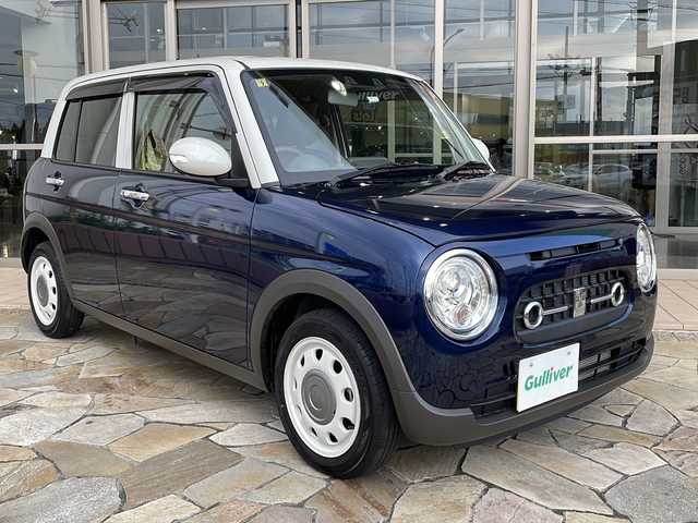 スズキ ラパン ＬＣ X 静岡県 2023(令5)年 0.7万km ノクターンブルーパールメタリック/ソフトベージュ 2トーン 純正ディスプレイオーディオ/・FM/・AM/・Bluetooth/・USB/・スマートフォン連携/主要装備/・バックカメラ/・ハーフレザーシート/・ＬＥＤヘッドライト/・シートヒーター/・デュアルカメラブレーキサポート/・スマートキー/・コーナーセンサー/・横滑り防止装置　/・アイドリングストップ/・レーンキープアシスト/・純正フロアマット