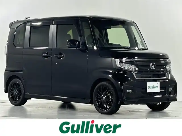 ホンダ Ｎ ＢＯＸ カスタム L ターボ 佐賀県 2023(令5)年 4.4万km クリスタルブラックパール 社外7インチナビ/ワンセグTV/CD/DVD/Bluetooth/バックカメラ/衝突被害軽減システム/レーダークルーズコントロール/レーンアシスト/オートライト/オートマチックハイビーム/クリアランスソナー/LEDヘッドライト/LEDフォグライト/前後ドライブレコーダー/両側パワースライドドア/ハーフレザーシート/運転席・助手席シートヒーター/チップアップシート/ISOFIX対応シート/後席サンシェード/シートバックテーブル/パドルシフト/純正フロアマット/純正15インチアルミホイール/スペアキー×１