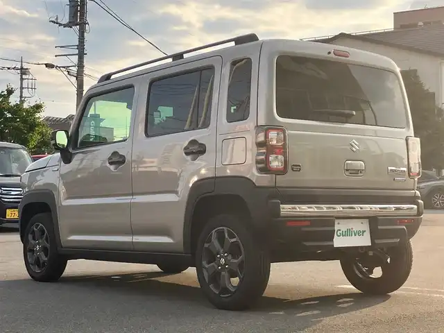 スズキ ハスラー タフワイルド 静岡県 2024(令6)年 0.1万km スチールシルバーM エンジンスタートボタン/パワーステアリング/パワーウィンドウ/アイドリングストップ/スマートキー/スペアキー１本/オートエアコン/クルーズコントロール/USB入力端子/純正９インチナビ（CD/BT/フルセグ）/D席N席シートヒーター/ルーフレール/純正アルミホイール/ABS/横滑り防止装置/コーナーセンサー/レーンキープアシスト/オートライト/オートマチックハイビーム/LEDヘッドライト/W+サイドエアバック/衝突軽減システム