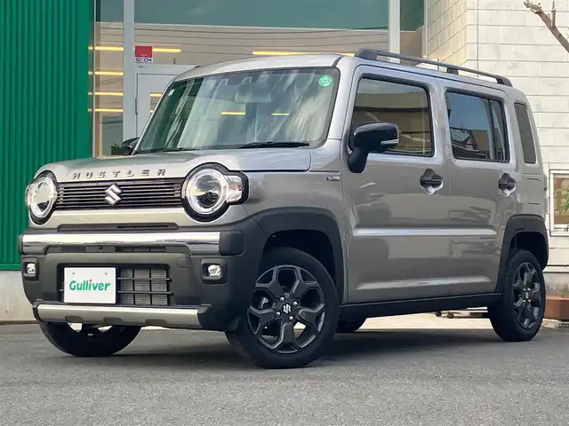 スズキ ハスラー タフワイルド 静岡県 2024(令6)年 0.1万km スチールシルバーM エンジンスタートボタン/パワーステアリング/パワーウィンドウ/アイドリングストップ/スマートキー/スペアキー１本/オートエアコン/クルーズコントロール/USB入力端子/純正９インチナビ（CD/BT/フルセグ）/D席N席シートヒーター/ルーフレール/純正アルミホイール/ABS/横滑り防止装置/コーナーセンサー/レーンキープアシスト/オートライト/オートマチックハイビーム/LEDヘッドライト/W+サイドエアバック/衝突軽減システム