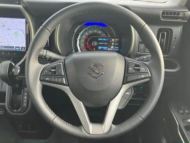 スズキ ハスラー タフワイルド 静岡県 2024(令6)年 0.1万km スチールシルバーM エンジンスタートボタン/パワーステアリング/パワーウィンドウ/アイドリングストップ/スマートキー/スペアキー１本/オートエアコン/クルーズコントロール/USB入力端子/純正９インチナビ（CD/BT/フルセグ）/D席N席シートヒーター/ルーフレール/純正アルミホイール/ABS/横滑り防止装置/コーナーセンサー/レーンキープアシスト/オートライト/オートマチックハイビーム/LEDヘッドライト/W+サイドエアバック/衝突軽減システム