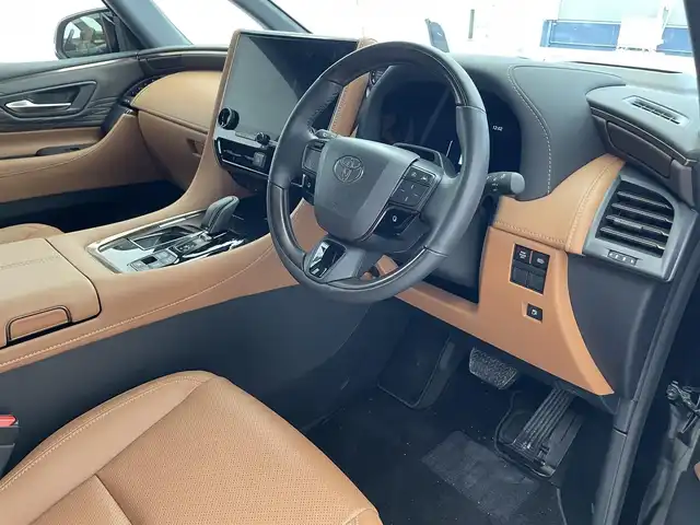 トヨタ ヴェルファイア Z プレミア 滋賀県 2023(令5)年 1万km ブラック 純正14インチナビ/【Bluetooth/フルセグTV/USB/Miracast】/トヨタセーフティセンス/・プリクラッシュセーフティ/・レーントレーシングアシスト/・レーダークルーズコントロール/・オートマチックハイビーム/全方位カメラ/クリアランスソナー/レザーシート/両側パワースライドドア/パワーバックドア/LEDヘッドライト/D/Nパワーシート/二列目パワーリクライニング/パワーオットマン/D/N/二列目シートヒーター/D/N/二列目シートベンチレーション/ステアリングヒーター/ワイヤレス充電/ビルトインETC2.0/デジタルインナーミラー/電動チルトテレスコピックステアリング/シートポジションメモリ/電動パーキングブレーキ/オートブレーキホールド/パドルシフト/後席パワーサンシェード/プッシュスタート/スマートキー/ステアリングリモコン