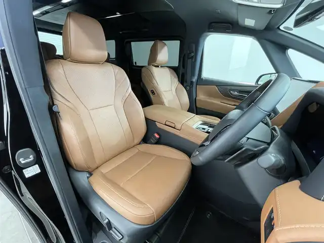 トヨタ ヴェルファイア Z プレミア 滋賀県 2023(令5)年 1万km ブラック 純正14インチナビ/【Bluetooth/フルセグTV/USB/Miracast】/トヨタセーフティセンス/・プリクラッシュセーフティ/・レーントレーシングアシスト/・レーダークルーズコントロール/・オートマチックハイビーム/全方位カメラ/クリアランスソナー/レザーシート/両側パワースライドドア/パワーバックドア/LEDヘッドライト/D/Nパワーシート/二列目パワーリクライニング/パワーオットマン/D/N/二列目シートヒーター/D/N/二列目シートベンチレーション/ステアリングヒーター/ワイヤレス充電/ビルトインETC2.0/デジタルインナーミラー/電動チルトテレスコピックステアリング/シートポジションメモリ/電動パーキングブレーキ/オートブレーキホールド/パドルシフト/後席パワーサンシェード/プッシュスタート/スマートキー/ステアリングリモコン