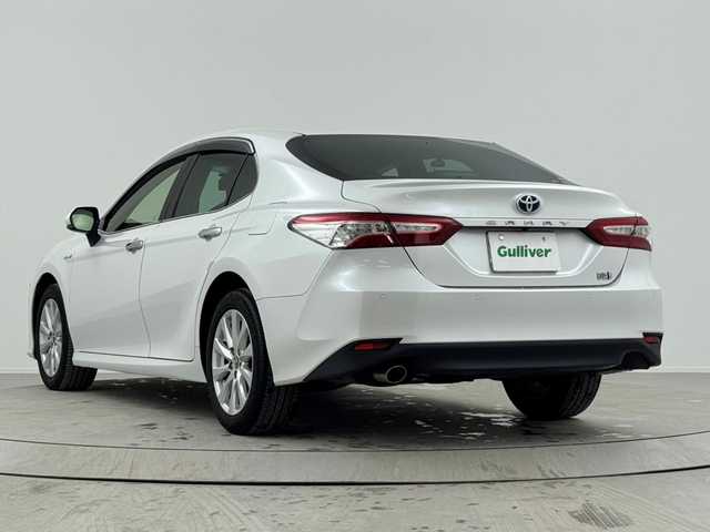 トヨタ カムリ G 熊本県 2018(平30)年 2.7万km プラチナホワイトパールマイカ 純正９型ナビ／フルセグＴＶ　/バックカメラ　/ビルトインＥＴＣ　/前後ドライブレコーダー　/コーナーセンサー　/レーダークルコン　/衝突軽減ブレーキ　/レーンキープ　/ＢＳＭ　/ＰＫＳＢ　/ＭＴモード付ＡＴ　/パワーシート