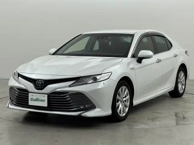 トヨタ カムリ G 熊本県 2018(平30)年 2.7万km プラチナホワイトパールマイカ 純正９型ナビ／フルセグＴＶ　/バックカメラ　/ビルトインＥＴＣ　/前後ドライブレコーダー　/コーナーセンサー　/レーダークルコン　/衝突軽減ブレーキ　/レーンキープ　/ＢＳＭ　/ＰＫＳＢ　/ＭＴモード付ＡＴ　/パワーシート
