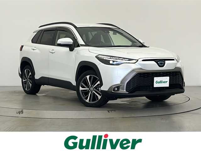 トヨタ カローラ クロス ハイブリッド Z 宮城県 2023(令5)年 5万km プラチナホワイトパールマイカ 4WD/ワンオーナー/純正９インチディスプレイオーディオナビ/(AM/FM/CD/DVD/USB/BT/TV/Miracast)/全方位カメラ/HDMI入力端子/CD・DVDプレーヤー/社外ツイーター/ハーフレザー/パワーシート/シートヒーター/レーダークルーズコントロール/ETC/前後ドライブレコーダー/プッシュスタート/スマートキー/オートマチックハイビーム/LEDヘッドライト/フォグランプ/ドアバイザー/純正フロアマット/純正18インチアルミホイール/保証書
