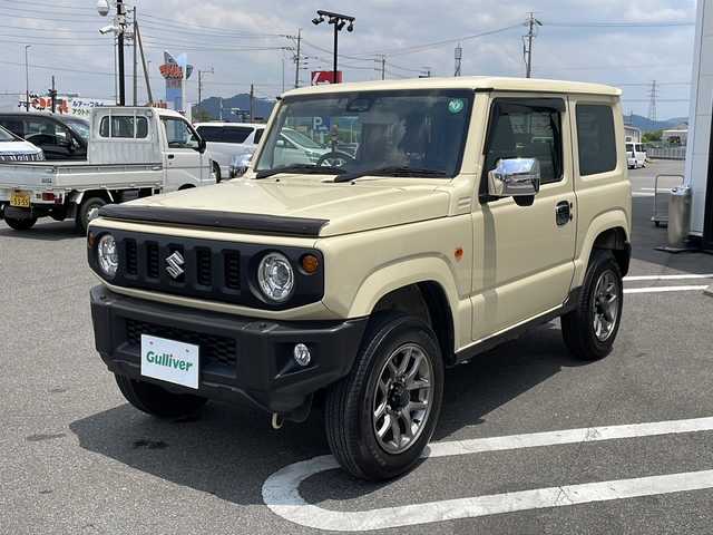 スズキ ジムニー XC 岐阜県 2023(令5)年 1.2万km シフォンアイボリーM ワンオーナー/4WDターボ/純正8インチSDナビ /フルセグテレビ /バックカメラ　/デュアルセンサーブレーキサポート　/エマージェンシーストップシグナル/LEDヘッドライト　/クルーズコントロール/サイドエアロ　/スマートキー　/シートヒーター前席　/ドライブレコーダー前後　/ビルトインETC/プッシュスタート/保証書/取扱説明書/Blue tooth接続/CDチェンジャー/USB入力端子/iPod接続/フルフラットシート/社外フロアマット/純正16アルミホイール/横滑り防止装置/レーンキープアシスト/オートライト/ダウンヒルアシストコントロール/エアバッグW＋サイド/衝突被害軽減システム/ドアバイザー/ボンネットバイザー/サイドアンダーミラー/ミラーヒーター/ウィンカーミラー/給油口ガラスリッド/リアステップラダー/UVカット機能付きガラス