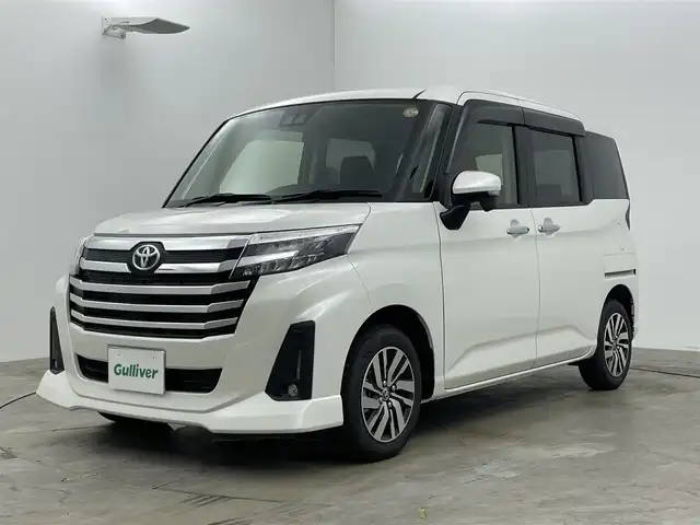 トヨタ ルーミー カスタムG 岡山県 2025(令7)年 0.1万km パールホワイトⅢ 衝突軽減ブレーキ/追従型クルーズコントロール/9インチディスプレイオーディオ/【Bluetooth/フルセグTV/HDMI/Carplay】/前席シートヒーター/バックカメラ/ＬＥＤヘッドライト＆LEDフォグランプ/オートハイビーム/オートブレーキホールド/アイドリングストップ/プッシュスタート/純正フロアマット/コーナーセンサー（前後）/踏み間違い防止/横滑り防止/ISOFIX/ステアリングスイッチ/シートリフター/シートバックテーブル/ウインカーミラー/ドアバイザー/両側パワースライドドア/新車保証書/取扱説明書/スマートキー×2