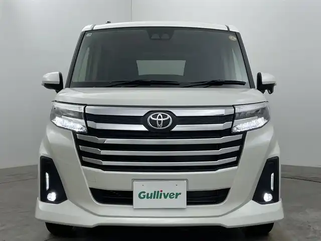トヨタ ルーミー カスタムG 岡山県 2025(令7)年 0.1万km パールホワイトⅢ 衝突軽減ブレーキ/追従型クルーズコントロール/9インチディスプレイオーディオ/【Bluetooth/フルセグTV/HDMI/Carplay】/前席シートヒーター/バックカメラ/ＬＥＤヘッドライト＆LEDフォグランプ/オートハイビーム/オートブレーキホールド/アイドリングストップ/プッシュスタート/純正フロアマット/コーナーセンサー（前後）/踏み間違い防止/横滑り防止/ISOFIX/ステアリングスイッチ/シートリフター/シートバックテーブル/ウインカーミラー/ドアバイザー/両側パワースライドドア/新車保証書/取扱説明書/スマートキー×2