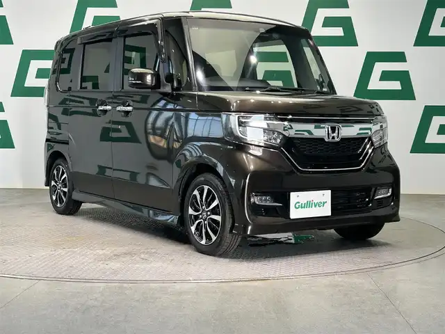 ホンダ Ｎ ＢＯＸ カスタム G L ホンダセンシング 鹿児島県 2018(平30)年 4.7万km プレミアムグラマラスブロンズP ホンダセンシング/アイドリングストップ/両側パワースライドドア/純正8インチSDナビ【VXU-195NBi】/（CD/DVD/フルセグ/Bluetooth/SD）/バックカメラ/ETC/純正前方ドライブレコーダー/ステアリングリモコン/チップアップシート/後席ロールサンシェード/純正LEDヘッドライト/フロントフォグランプ/オートライト/純正フロアマット/純正ドアバイザー/純正14インチアルミ