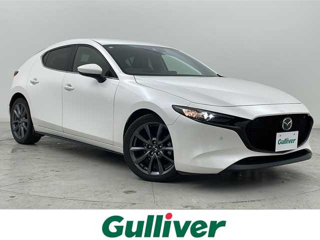 マツダ マツダ３ファストバック 15S ツーリング 宮城県 2020(令2)年 3.3万km スノーフレイクホワイトパールマイカ 禁煙車/360°ビュー・モニター＋ドライバー・モニタリング/i-ACTIVSENSE/・スマート・ブレーキ・サポート/・ブラインド・スポット・モニタリング/・ハイ・ビーム・コントロールシステム/・レーンキープ・アシスト・システム/・マツダ・レーダー・クルーズ・コントロール/・ヘッドアップディスプレイ/純正ナビ/・CD.DVD.SD.BT.USB.HDMI/フルセグTV/ビルトインETC/LEDヘッドライト/電動パーキングブレーキ/オートホールド機能/アイドリングストップ/横滑り防止装置/ステアリングスイッチ/プッシュスタート/スマートキー2個/純正18インチアルミホイール/純正フロアマット