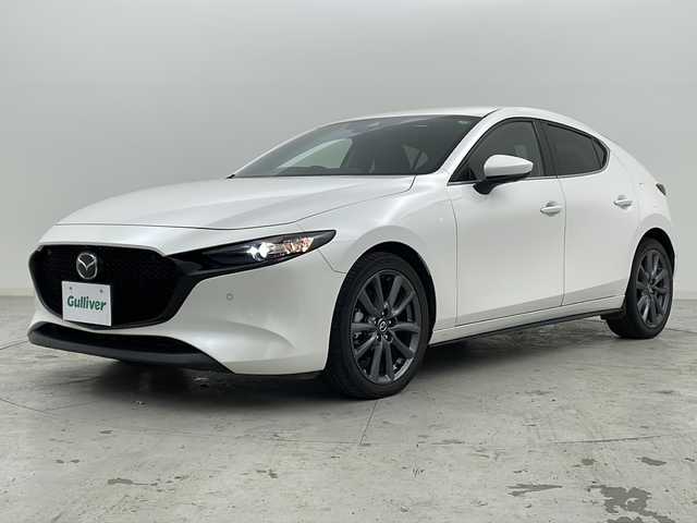 マツダ マツダ３ファストバック 15S ツーリング 宮城県 2020(令2)年 3.3万km スノーフレイクホワイトパールマイカ 禁煙車/360°ビュー・モニター＋ドライバー・モニタリング/i-ACTIVSENSE/・スマート・ブレーキ・サポート/・ブラインド・スポット・モニタリング/・ハイ・ビーム・コントロールシステム/・レーンキープ・アシスト・システム/・マツダ・レーダー・クルーズ・コントロール/・ヘッドアップディスプレイ/純正ナビ/・CD.DVD.SD.BT.USB.HDMI/フルセグTV/ビルトインETC/LEDヘッドライト/電動パーキングブレーキ/オートホールド機能/アイドリングストップ/横滑り防止装置/ステアリングスイッチ/プッシュスタート/スマートキー2個/純正18インチアルミホイール/純正フロアマット