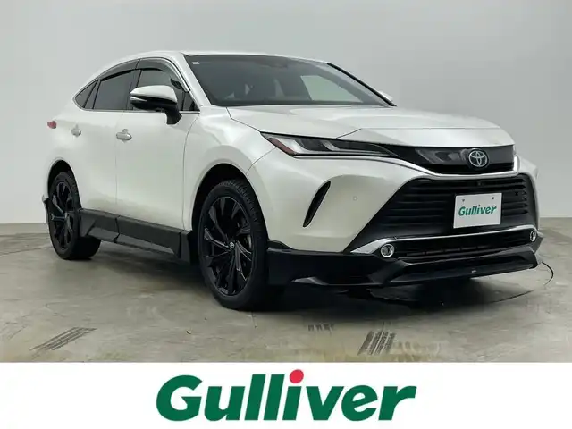 トヨタ ハリアー ハイブリッド Z レザーパッケージ 岡山県 2020(令2)年 5.4万km ホワイトパールクリスタルシャイン ＧＲエアロ（F/S/R)/ＧＲ２０インチAW(245/45R20)/ＪＢＬプレミアムサウンド/TRDマフラー/スターターリモコン（取扱説明書付き）/純正１２．３インチディスプレイオーディオ/【ナビ/Bluetooth/フルセグTV/Carplay/AUX/USB】/ブラックレザーシート/プリクラッシュセーフティ/パノラミックビューモニター/ビルトインＥＴＣ２．０/オートハイビーム/ＬＥＤヘッドライト/前席シートヒーター/前席エアシート/ステアリングヒーター/前席パワーシート/シートメモリー/社外20インチアルミホイール/純正フロアマット/コーナーセンサー（前後）/スマートキー×２/新車保証書/取扱説明書
