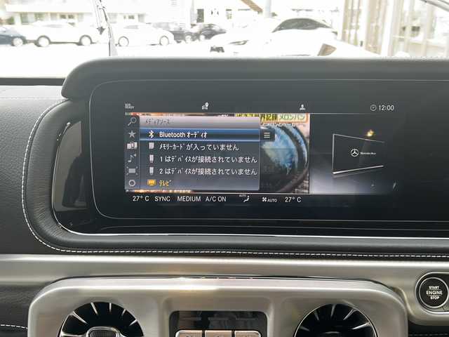 メルセデス・ベンツ ゲレンデヴァーゲン Ｇ４００ｄ AMGライン 兵庫県 2023(令5)年 0.4万km パール ワンオーナー]/Gマヌファクトゥーアプログラム/ラグジュアリーパッケージ/純正メーカーSDナビ/　Bluetooth/USB/AM/FM/フルセグテレビ（横行中視聴可能）/Burmestarサラウンドシステム/純正ビルトインETC2.0/前後ドライブレコーダー/全方位カメラ/リラクゼーション機能/サンルーフ/パドルシフト/シートメモリ/パワーシート（D+N席）/シートヒーター（全席）/エアシート（D+N席）/パーキングアシスト/アイドリングストップ/アダプティブクルーズコントロール/アンチロック・ブレーキ・システム/レーンキープアシスト/センターデフロック/前後コーナーセンサー/盗難防止装置/横滑り防止装置/衝突被害軽減システム/パワーステアリング/パワーウィンドウ/オートマチックハイビーム/純正フロアマット/純正アルミホイール/スペアキー（１本）/取扱説明書/保証書/記録簿（R5）