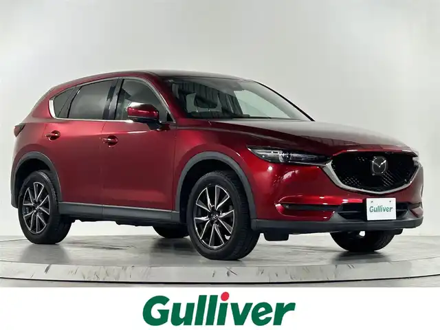 マツダ ＣＸ－５ XD Lパッケージ 佐賀県 2017(平29)年 8.6万km ソウルレッドクリスタルM 純正8インチナビ/フルセグTV/DVD/CD/Bluetooth/アルパイン製10.2インチフリップダウンモニター/BOSEプレミアムサウンド/バックカメラ/衝突被害軽減システム/ブラインドスポットモニター/レーダークルーズコントロール/レーンアシスト/オートライト/LEDヘッドライト/フォグライト/パーキングセンサー/ビルトインETC/電子パーキング/ブレーキホールド/ステアリングヒーター/レザーシート/全席シートヒーター/運転席・助手席パワーシート/パワーバックドア/メモリーシート/純正19インチアルミホイール/純正フロアマット