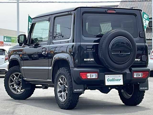 スズキ ジムニー XC 山口県 2021(令3)年 3.2万km ブルーイッシュブラックパール3 4WD/背面タイヤ/純正ナビ/・Bluetooth接続/・フルセグTV/クルーズコントロール/デュアルセンサーブレーキサポート/レーンキープアシスト/シートヒーター(D席/N席)/LEDヘッドライト/オートライト/レザー調シートカバー/純正16インチアルミホイール/純正フロアマット/スマートキー/スペアキー1本/取扱説明書