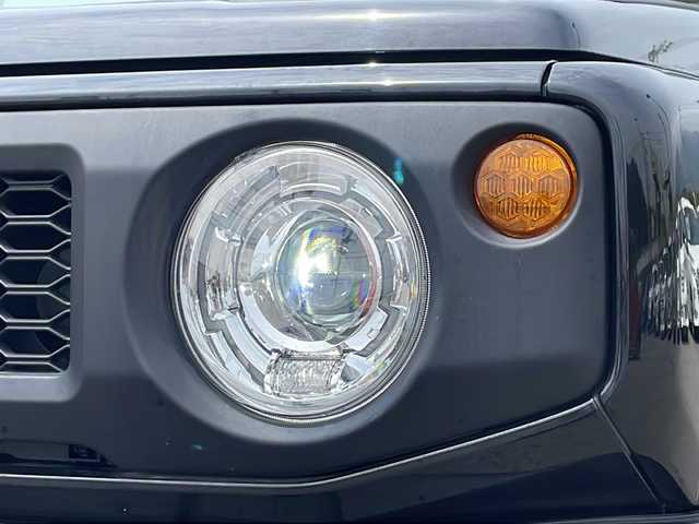 スズキ ジムニー XC 山口県 2021(令3)年 3.2万km ブルーイッシュブラックパール3 4WD/背面タイヤ/純正ナビ/・Bluetooth接続/・フルセグTV/クルーズコントロール/デュアルセンサーブレーキサポート/レーンキープアシスト/シートヒーター(D席/N席)/LEDヘッドライト/オートライト/レザー調シートカバー/純正16インチアルミホイール/純正フロアマット/スマートキー/スペアキー1本/取扱説明書