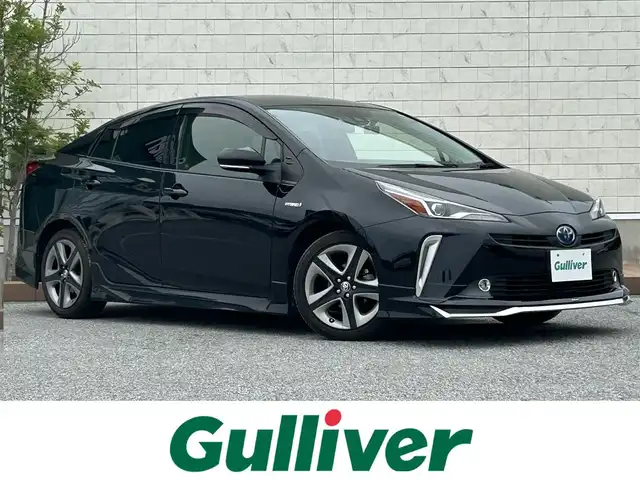トヨタ プリウス S ツーリングセレクション 滋賀県 2019(令1)年 7.9万km アティチュードブラックマイカ ガソリン（ハイブリッド）/2WD(FF)/CVT/モデリスタエアロ/社外ステアリング(純正積込有)/社外シフト(純正シフトノブ積込有)/9インチ社外ナビ【X9Z】/(FM/AM/CD/DVD/フルセグ/Bluetooth)/前後ドライブレコーダー/ETC/バックカメラ/ＴｏｙｏｔａＳａｆｅｔｙＳｅｎｓｅ/・プリクラッシュブレーキアシスト	/・レーンキープアシスト	/・レーダークルーズコントロール/運転席・助手席シートヒーター/電動格納ミラー/ステアリングスイッチ/オートライト/LEDヘッドライト/フロントフォグ/オートマチックハイビーム/フルオートエアコン/プッシュスタート/スマートキー/スペアキー/純正フロアマット/ドアバイザー
