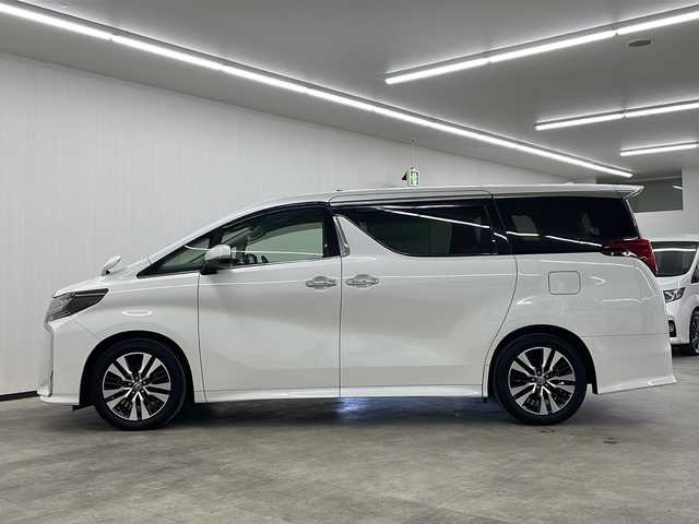 トヨタ アルファード S Cパッケージ 長崎県 2020(令2)年 3.5万km ホワイトパールクリスタルシャイン 純正メーカーナビ/フルセグ/ＤＶＤ/ＢＴＡ/バックカメラ/純正ＥＴＣ/純正１２インチフリップダウン/トヨタセーフティセンス/・プリクラッシュセーフティ/・レーンキープアシスト/・先行車発信告知/前席・セカンドパワーシート（D席メモリ付き）/前席エアーシート・シートヒーター/純正ドラレコ（前方）/ハンドルヒーター/オートハイビーム/両側パワースライド/オットマンシート/電子制御パーキング/オートホールド/純正フロアマット/純正バイザー/リアサンシェード/純正１８インチアルミ/フォグライト/ＬＥＤヘッドライト/黒木目調パネル/ナノイー
