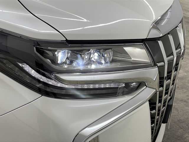 トヨタ アルファード S Cパッケージ 長崎県 2020(令2)年 3.5万km ホワイトパールクリスタルシャイン 純正メーカーナビ/フルセグ/ＤＶＤ/ＢＴＡ/バックカメラ/純正ＥＴＣ/純正１２インチフリップダウン/トヨタセーフティセンス/・プリクラッシュセーフティ/・レーンキープアシスト/・先行車発信告知/前席・セカンドパワーシート（D席メモリ付き）/前席エアーシート・シートヒーター/純正ドラレコ（前方）/ハンドルヒーター/オートハイビーム/両側パワースライド/オットマンシート/電子制御パーキング/オートホールド/純正フロアマット/純正バイザー/リアサンシェード/純正１８インチアルミ/フォグライト/ＬＥＤヘッドライト/黒木目調パネル/ナノイー