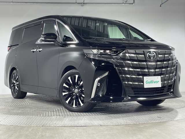 トヨタ アルファードハイブリット Z 神奈川県 2024(令6)年 2.2万km ブラック トヨタセーフティセンス/純正14.1型ディスプレイオーディオ/・BT/フルセグTV/MiraCast/USB/パノラミックビューモニター/ユニバーサルステップ/純正12.1型フリップダウンモニター/トヨタチームメイト/左右独立ムーンルーフ/デジタルインナーミラー/置くだけ充電/AC100V/前後ドライブレコーダー/ビルトインETC2.0/パーキングアシスト/レザー調シート/パワーシート(D/N/2)/メモリシート(D)/シートヒーター(D/N/2)/ベンチレーション(D/N/2)/ブラインドスポットモニター/パワーバックドア/電動サンシェード/nanoeX/ウッドコンビステアリング/ステアリングスイッチ/パドルシフト/ステアリングヒーター/Autoライト/電動サイドブレーキ/オートブレーキホールド/EVモード/三眼LEDヘッドライト/フォグランプ/シーケンシャルウィンカー/スマートキー/スペアキー/プッシュスタートボタン/電動格納ミラー/ウィンカーミラー/純正フロアマット/純正19インチアルミホイール/純正ドアバイザー