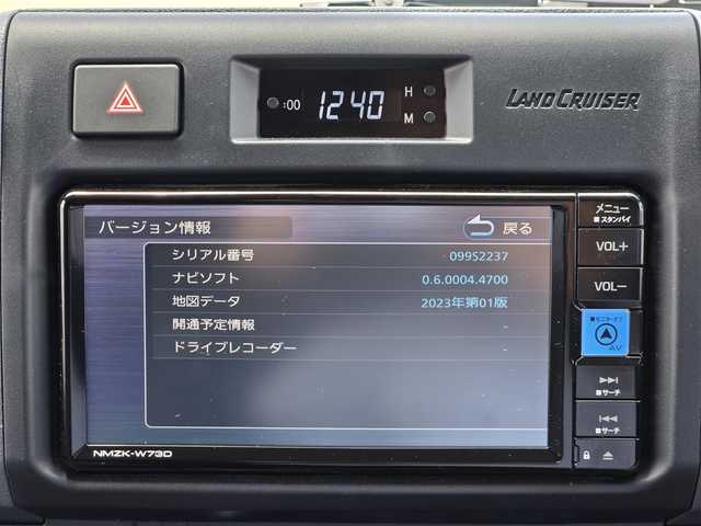 トヨタ ランドクルーザー AX 鹿児島県 2024(令6)年 1万km ベージュ クルーズコントロール　/ＥＴＣ　/純正ＳＤナビ（ＮＭＺＫ－Ｗ７３Ｄ）　/Ｂｌｕｅｔｏｏｔｈオーディオ　/テレビキャンセラー　/ヒルディセントコントロール　/前後ドライブレコーダー　/ＭＴモード付きＡＴ/トヨタセーフティセンス/プリクラッシュセーフティ/ドライブスタートコントロール/横滑り防止装置/レーンキープアシスト/純正アルミホイール(16インチ)/フルセグテレビ