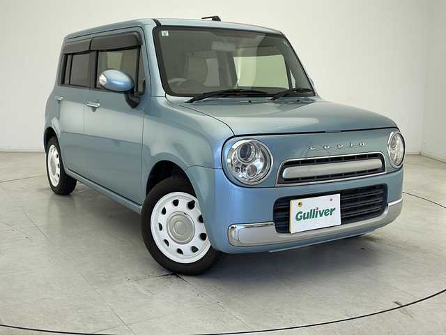 スズキ ラパン ショコラ X 千葉県 2015(平27)年 4.7万km フィズブルーパールメタリック 禁煙車/ダブルエアバック/社外ナビＴＶ/バックカメラ/ウインカードアミラー/オートエアコン/スマートキー/プッシュエンジンスタート/ドアバイザー/オートライト　/本革巻ハンドル　/リアプライバシーガラス/電動格納ドアミラー