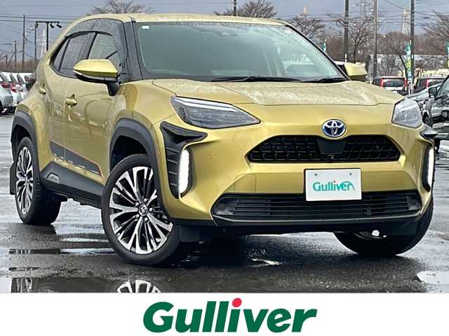 トヨタ ヤリスクロス ハイブリッド Z 道央・札幌 2021(令3)年 2.8万km ブラスゴールドメタリック ４WD/純正ディスプレイオーディオ（ナビ付）/AM/FM/USB/BT/トヨタセーフティセンス/横滑り防止装置/レーダークルーズコントロール/ダウンヒルアシストコントロール/レーンキープアシスト/パーキングアシスト/クリアランスソナー/ブラインドスポットモニター/リアクロストラフィックアラート/パーキングサポートブレーキ/ロードサインアシスト/パノラミックビューモニター/ビルトインETC2.0/ドライブレコーダー/EVMODE/DRIVEMODE切替/D席パワーシート/前席シートヒーター/ハーフレザーシート/革巻きステアリング/ステアリングリモコン/電動パーキング/ブレーキホールド/レーダー探知機/プッシュスタート/スマートキー/LEDヘッドライト/オートライト/ブレーキホールド/プッシュスタート/スマートキー/LEDヘッドライト/オートライト/オートハイビーム/ヘッドライトレベライザー/電動格納ミラー/ヒーテッドドアミラー/ウィンカーミラー/純正フロアマット/ドアバイザー/スペアキー/TRDマフラー