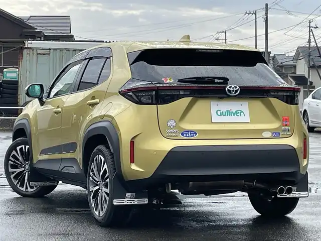 トヨタ ヤリスクロス ハイブリッド Z 道央・札幌 2021(令3)年 2.8万km ブラスゴールドメタリック ４WD/純正ディスプレイオーディオ（ナビ付）/AM/FM/USB/BT/トヨタセーフティセンス/横滑り防止装置/レーダークルーズコントロール/ダウンヒルアシストコントロール/レーンキープアシスト/パーキングアシスト/クリアランスソナー/ブラインドスポットモニター/リアクロストラフィックアラート/パーキングサポートブレーキ/ロードサインアシスト/パノラミックビューモニター/ビルトインETC2.0/ドライブレコーダー/EVMODE/DRIVEMODE切替/D席パワーシート/前席シートヒーター/ハーフレザーシート/革巻きステアリング/ステアリングリモコン/電動パーキング/ブレーキホールド/レーダー探知機/プッシュスタート/スマートキー/LEDヘッドライト/オートライト/ブレーキホールド/プッシュスタート/スマートキー/LEDヘッドライト/オートライト/オートハイビーム/ヘッドライトレベライザー/電動格納ミラー/ヒーテッドドアミラー/ウィンカーミラー/純正フロアマット/ドアバイザー/スペアキー/TRDマフラー