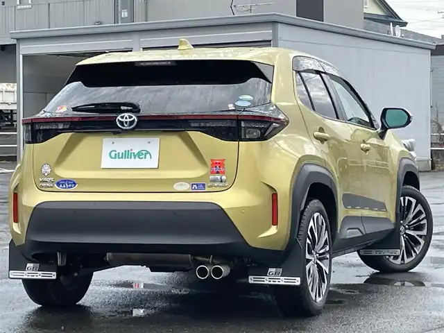 トヨタ ヤリスクロス ハイブリッド Z 道央・札幌 2021(令3)年 2.8万km ブラスゴールドメタリック ４WD/純正ディスプレイオーディオ（ナビ付）/AM/FM/USB/BT/トヨタセーフティセンス/横滑り防止装置/レーダークルーズコントロール/ダウンヒルアシストコントロール/レーンキープアシスト/パーキングアシスト/クリアランスソナー/ブラインドスポットモニター/リアクロストラフィックアラート/パーキングサポートブレーキ/ロードサインアシスト/パノラミックビューモニター/ビルトインETC2.0/ドライブレコーダー/EVMODE/DRIVEMODE切替/D席パワーシート/前席シートヒーター/ハーフレザーシート/革巻きステアリング/ステアリングリモコン/電動パーキング/ブレーキホールド/レーダー探知機/プッシュスタート/スマートキー/LEDヘッドライト/オートライト/ブレーキホールド/プッシュスタート/スマートキー/LEDヘッドライト/オートライト/オートハイビーム/ヘッドライトレベライザー/電動格納ミラー/ヒーテッドドアミラー/ウィンカーミラー/純正フロアマット/ドアバイザー/スペアキー/TRDマフラー