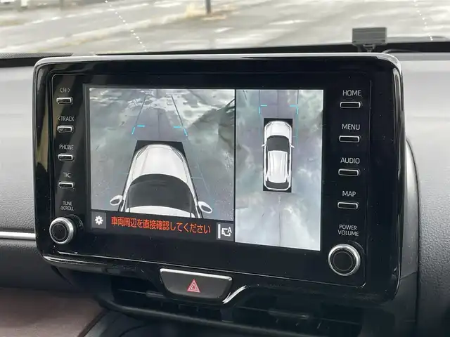 トヨタ ヤリスクロス ハイブリッド Z 道央・札幌 2021(令3)年 2.8万km ブラスゴールドメタリック ４WD/純正ディスプレイオーディオ（ナビ付）/AM/FM/USB/BT/トヨタセーフティセンス/横滑り防止装置/レーダークルーズコントロール/ダウンヒルアシストコントロール/レーンキープアシスト/パーキングアシスト/クリアランスソナー/ブラインドスポットモニター/リアクロストラフィックアラート/パーキングサポートブレーキ/ロードサインアシスト/パノラミックビューモニター/ビルトインETC2.0/ドライブレコーダー/EVMODE/DRIVEMODE切替/D席パワーシート/前席シートヒーター/ハーフレザーシート/革巻きステアリング/ステアリングリモコン/電動パーキング/ブレーキホールド/レーダー探知機/プッシュスタート/スマートキー/LEDヘッドライト/オートライト/ブレーキホールド/プッシュスタート/スマートキー/LEDヘッドライト/オートライト/オートハイビーム/ヘッドライトレベライザー/電動格納ミラー/ヒーテッドドアミラー/ウィンカーミラー/純正フロアマット/ドアバイザー/スペアキー/TRDマフラー