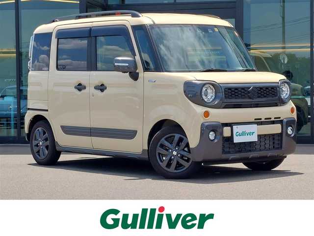 スズキ スペーシア ギア HYBRID XZターボ 東京都 2023(令5)年 1.6万km シフォンアイボリーM スズキセーフティサポート/・デュアルカメラブレーキサポート/・車線逸脱警報機能/・先行車発進お知らせ機能/・標識認知機能/・誤発進抑制機能/・アダプティブクルーズコントロール/・ヘッドアップディスプレイ/・ブラインドスポットモニター/・全方位モニター/ルーフレール/プッシュスタート/アイドリングストップ/パドルシフト/純正8インチナビ/フルセグTV/HDMI入力/ETC/ルームミラー型 前後ドライブレコーダー/両側パワースライドドア/シートヒーター/パーソナルテーブル/後席ロールサンシェード/LEDヘッドライト/ドアバイザー/14インチ純正アルミホイール