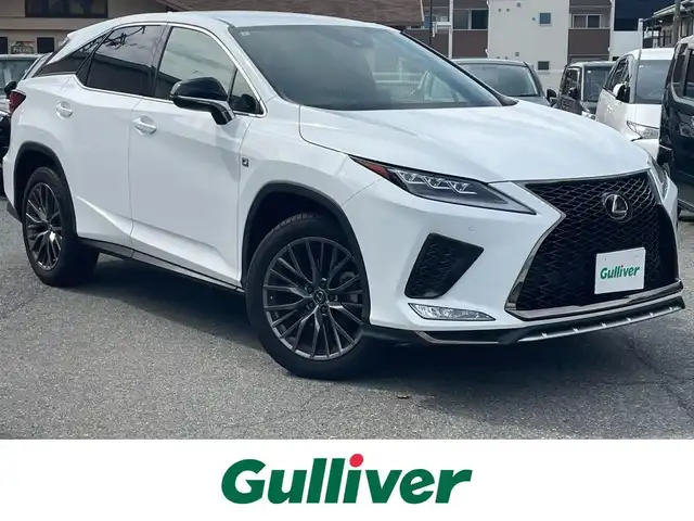 レクサス ＲＸ 300 Fスポーツ 兵庫県 2022(令4)年 2.5万km ホワイトノーヴァガラスフレーク 純正12.3インチナビ/・フルセグTV/・CD/DVD/・Bluetooth接続/・USB/・100V電源/トヨタセーフティセンス/・レーンキープアシスト/・レーダークルーズコントロール/・オートマチックハイビーム/ブラインドスポットモニター/コーナーセンサー/アイドリングストップ/ヘッドアップディスプレイ/エアシートヒーター（前席のみエアシート付き）/ステアリングヒーター/電動リアゲート/前席パワーシート（運転席メモリー付き）/純正20インチアルミホイール/ＥＴＣ/三眼ＬＥＤ/前後ドライブレコーダー(ZDR-037)