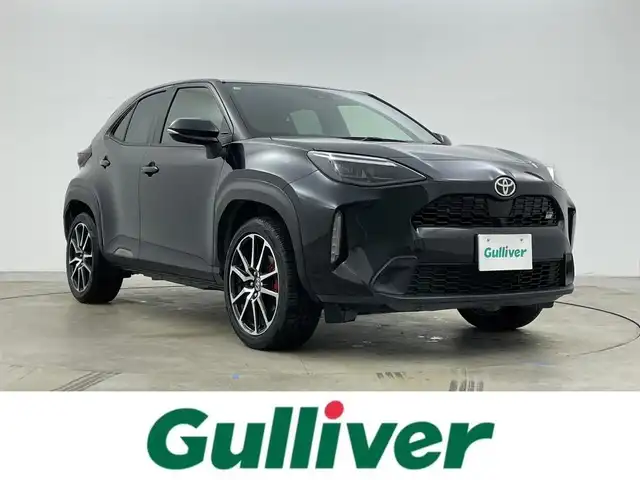トヨタ ヤリスクロス ハイブリッド GRスポーツ 岡山県 2023(令5)年 2.2万km ブラックマイカ 純正８インチナビ　/【Carplay/AndroidAuto/Bluetooth】/全方位カメラ　/レーダークルーズコントロール　/ビルトインＥＴＣ　/ブラインドスポットモニター/前席シートヒーター　/ハーフレザーシート/ＬＥＤヘッドライト　/ステアリングヒーター　/電動リアゲート　/コーナーセンサー　/オートハイビーム　/スペアキー×1/禁煙車/オートブレーキホールド